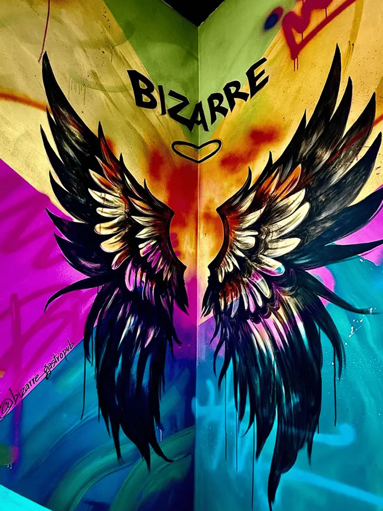 Bizarre Gastro Pub mural wall — colourful street art in Ramsay, Calgary